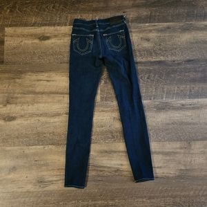 True Religion Jeans and button down top.